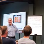 Neil Ashdown delivering fire door specialist training to room of attendees