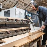 CNC Machine at Country Hardwood Factory with worker